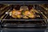 Espetos Giratórios: permitem assar alimentos maiores de forma mais homogênea ao usar o grill churrasqueira em ambos os fornos principal e auxiliar.