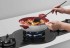 Suporte de Panelas Wok: acessório que permite utilizar panelas Wok com mais praticidade e segurança no queimador Triplo.