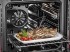 Função Grill Ventilado: usa as resistências superiores e do ventilador que aumentam a eficácia do aquecimento pela circulação forçada do ar em todo o forno. Ideal para evitar que os alimentos ressequem na superfície, permitindo que o calor penetre diretamente de forma homogênea.